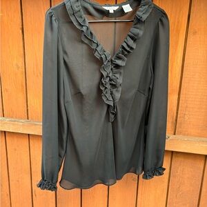 Capacity women’s ruffle black long sleeve top